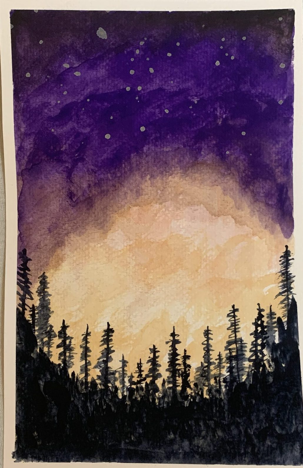 Watercolor of black pine silhouettes against a glowing peach horizon under a purple starry sky