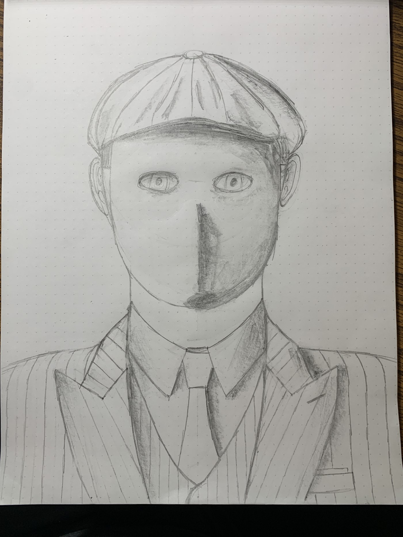 Graphite pencil sketch of a man's portrait wearing a flat cap and pinstripe suit